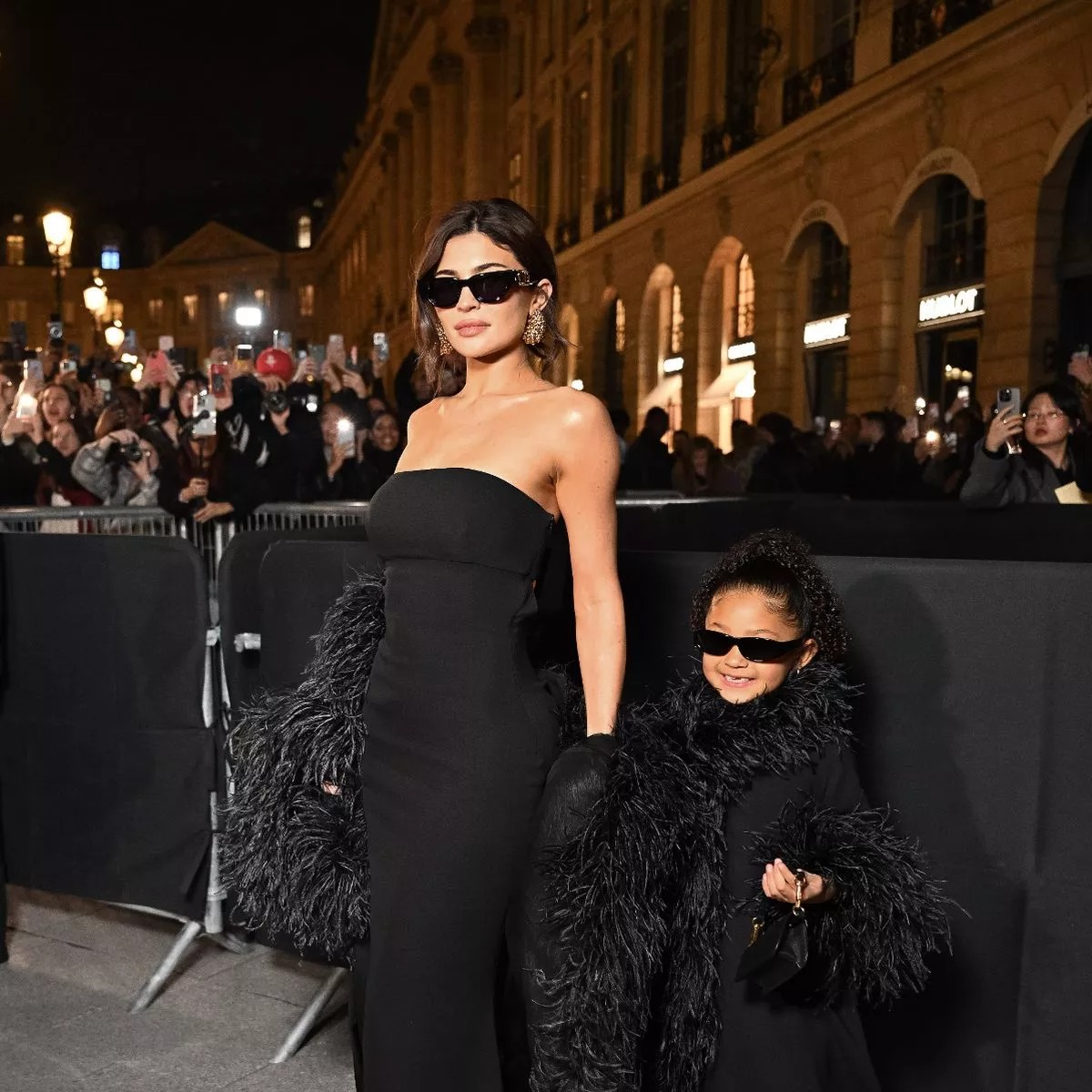 Kylie Jenner And Stormi Webster Stun In Matching Black Feather Dresses ...